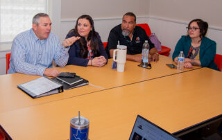 Steve Fisher Sarah Fisher Fred Ramirez and Lindy Dahl sit at a conference table at the Monument Business Alliance business networking group in Monument.